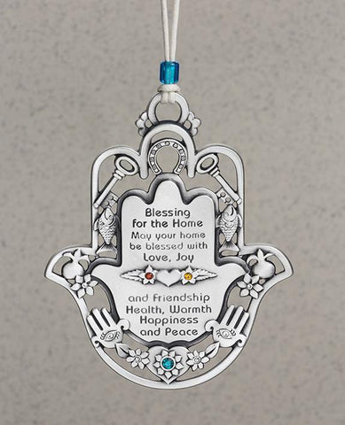 An impressive and exceptional hanging Home Blessing. Shaped like a Hamsa and decorated by motifs such as a key, a fish, a horseshoe and a pomegranate, which according to Judaism symbolize respectively: a new way, fertility, luck and abundance. The ornament is coated in sterling silver, embedded with colorful Swarovski crystals, and comes with a faux leather string for hanging, decorated with a blue bead. A fantastic gift to grant any new home, great for new beginnings, or for anyone you wish to greet with l