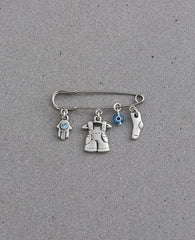 Baby Boy pin with cute elements, sterling silver plated.  Length: 4 cm  Width: 5 cm