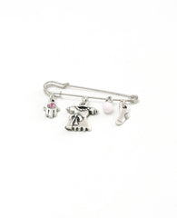 Baby Girl pin with cute elements, sterling silver plated.  Length: 4 cm  Width: 5 cm