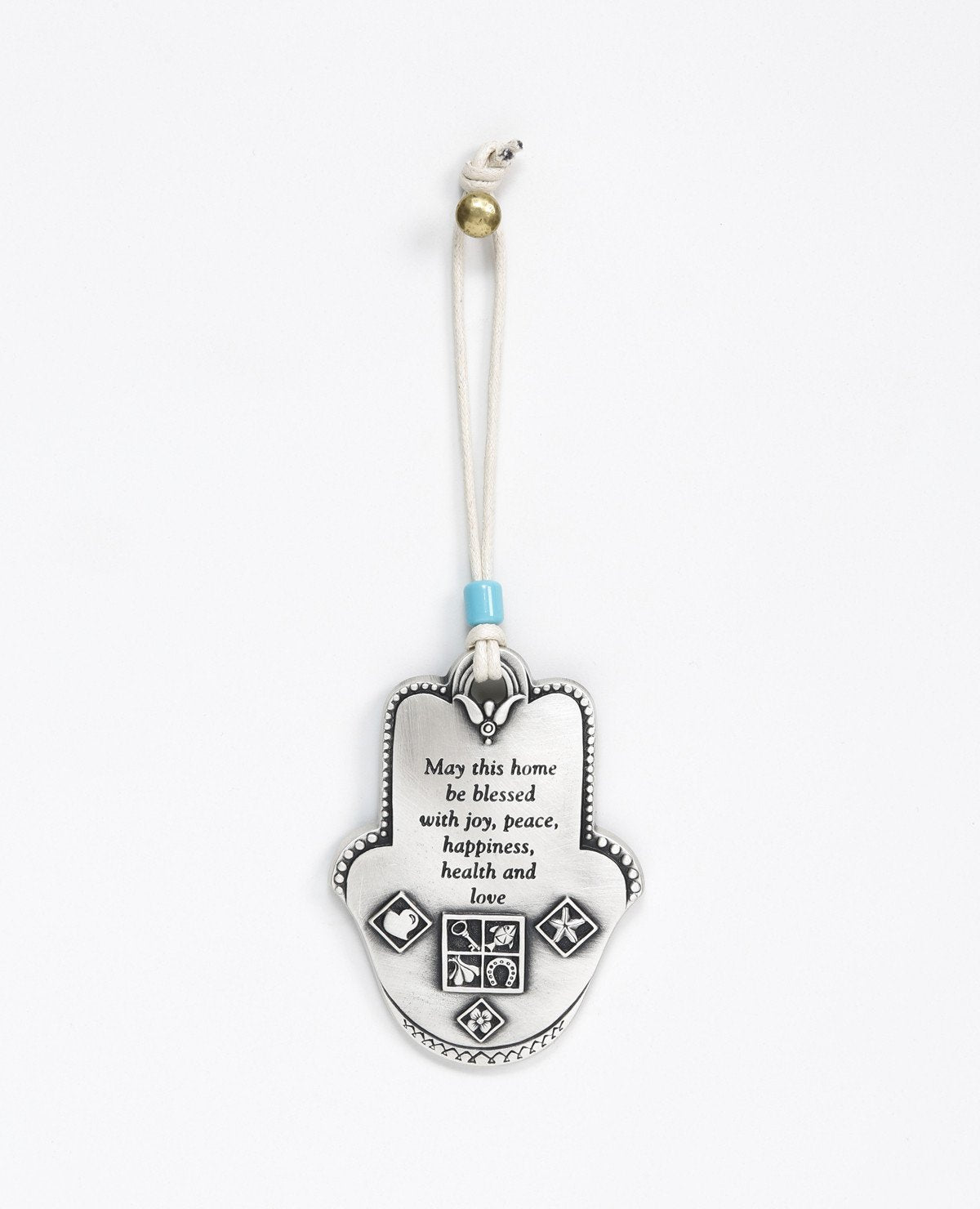 Uniquely designed sterling silver coated Hamsa Home Blessing hanging ornament. The Hamsa is decorated with embossed geometrical shapes, symbolizing abundance, fertility, success and protection from the "evil eye". The ornament makes a wonderful gift for any home, one that displays attentiveness, invoking good luck and blessings to anyone who shall receive it. Comes with a faux leather string for hanging decorated with a turquoise bead. Additional languages available: Hebrew and Russian.  Length: 9 cm  Width
