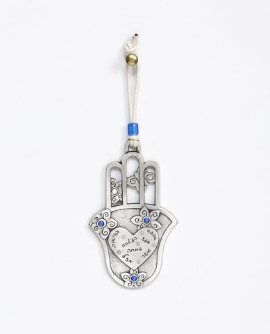 An aritistic, charming and delicately designed Hamsa hanging ornament. The Hamsa is coated in sterling silver and on its bottom part has a smooth plate with a big heart on it. Written inside the heart are seven blessings for: love, abundance, success, happiness, health, joy and luck. Surrounding the heart are flower decorations embedded with blue colored stones. On the top part of the Hamsa are three hollowed out fingers, with butterflies in between them. The ornament comes with a natural colored faux leath