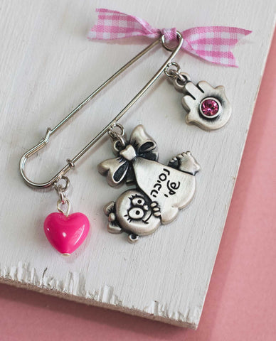 Baby Girl pin with cute elements, sterling silver plated.  Length: 5 cm  Width: 4 cm