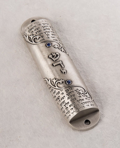 Sterling silver plated Mezuza, embeded with swarovsky crystals. Suitable for 12 cm parchment  Length: 16 cm  Width: 4 cm