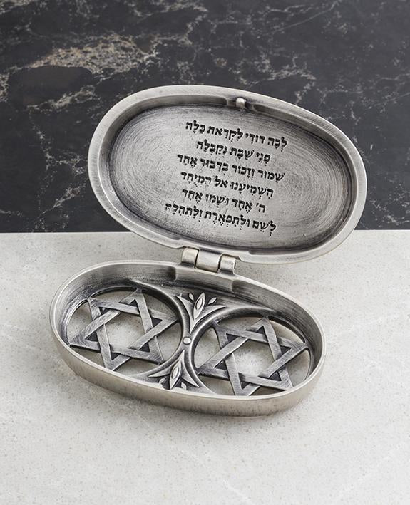 Sterling silver plated candlesticks with Jerusalem embeded on them.   Length: 9 cm  Width: 6 cm