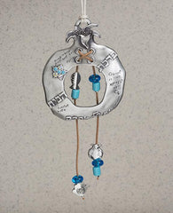 An enchanting pomegranate ornament with faux leather strings upon which appear motifs of blessings for good fortune and many colorful beads. The pomegranate is decorated with an abundance of different blessings, most suitable to grant to someone as a house warming gift, or as an original present for anyone you love. The pomegranate is coated in sterling silver and embedded with turquoise Swarovski crystals. Comes in your choice of blue or colorful embedded stones.   Length: 10 cm  Width: 8 cm