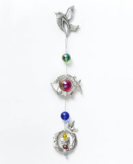 A delicate and beautiful hanging wall ornament, bringing together a few blessing motifs: a bird, a fish and a pomegranate, all hanging from a subtle silver string. The ornament is coated in sterling silver and is decorated with colorful beads. The bird and pomegranate are engraved with words of blessing for harmony, luck, success, stability, and joy. Makes a charming gift for any occasion and for anywhere in the house or office. It's so pleasant to gaze at this lovely ornament and smile every moment with gr