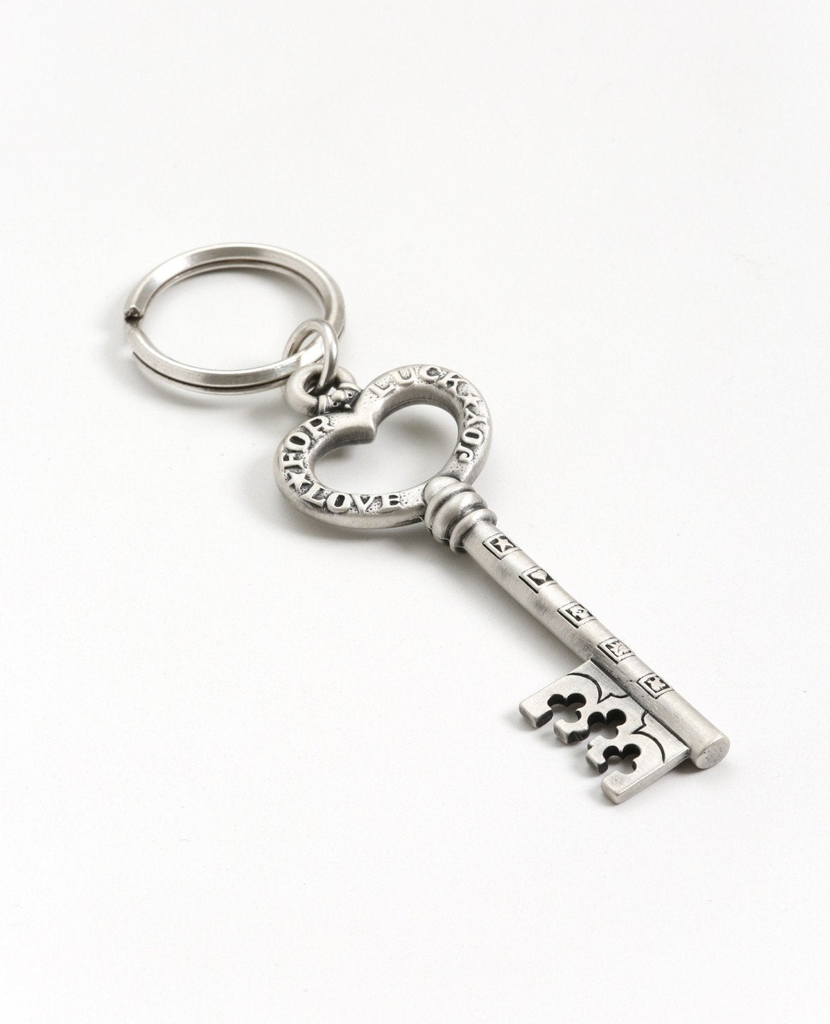 A pretty and impressively designed keychain in the shape of a key with a heart. On one side it is delicately decorated in black, and on the other side appear the words: For Luck, Love, Joy.
A special and joyful gift that's always good to have in your pocket. For English speakers in Israel and abroad, a useful reminder of our loved ones and the blessings we hold for them in our heart. 
The keychain is coated in sterling silver, strong, reliable and oh so pretty!  Length: 9 cm  Width: 3 cm