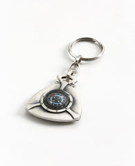 A famous comic Hebrew expression: "drive safe, the keys are inside". A cute keychain that reminds Israelis of funny times. Designed as a triangular plate, on one side is an embossed circle on which the sentence "drive safe the keys are inside" appears. On the other side is a compass, to never lose the way. The most observant people will also notice a peace sign. The keychain is coated in sterling silver and is strong and reliable. A gift that is fun to grant! It includes a blessing, direction, and a smile. 