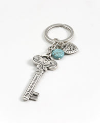 Love is the key to everything! Always! A keychain that is all love. Designed as a large and impressive key decorated with embossed artistic elements and tiny hearts. On one side the sentence "Love Is The Key" is engraved, and on the other side the sentence "The Key To My Heart". Connected to the top of the key is a chain with a sweet heart and a beautiful turquoise stone hanging upon it. The keychain is coated in sterling silver and is strong and reliable. An exciting gift for those still searching for the 