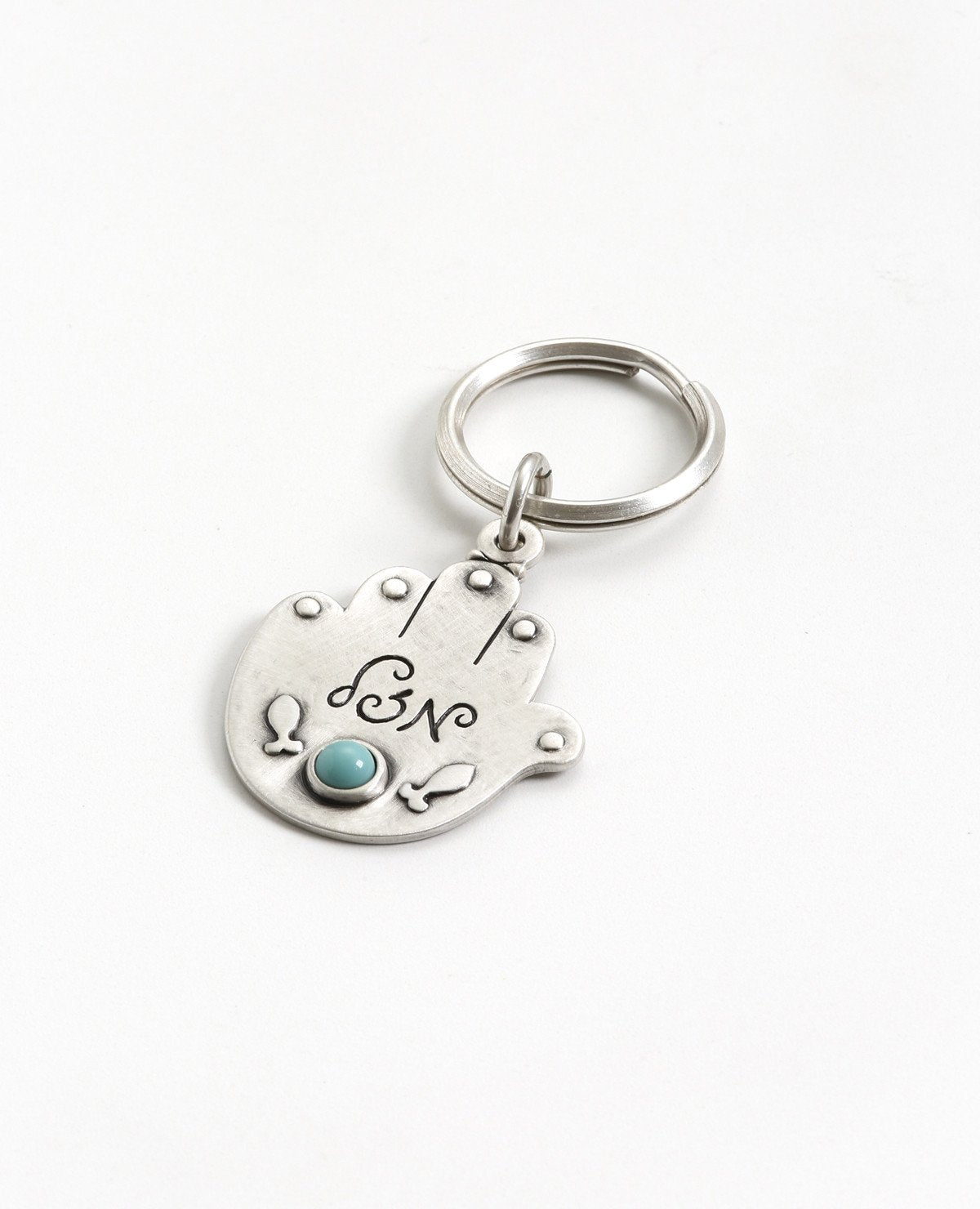 Sterling silver plated key ring with a Swarovsky crystal.  Length: 8 cm  Width: 4 cm
