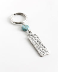 A classically designed keychain - for him or for her. Shaped like an elongated rectangle with the words "Everything is Possible!". Written on the other side are empowering words of hope and inspiration. A rounded turquoise bead at the top of the keychain completes the classic look. The keychain is coated in sterling silver and is strong and reliable. A gift that is always appropriate to give to a special person, in any opportunity, to remind that when you want something and believe - everything is possible!