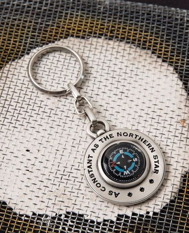 An intriguingly designed and one of a kind keychain. One side is a (real) compass encircled by the words "As constant as the northern star". On the other side is an ancient drawing of the map of the world. The keychain is coated in sterling silver and is strong and reliable. A charming and useful gift that will always remind its owner that North is always there and all you have to do is find it. Compass is already inside.    Length: 9 cm  Width: 4 cm