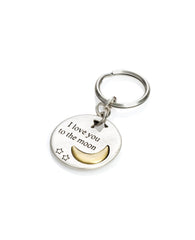 A charming keychain that comes with great love!
Designed in the shape of a circle with one side having an imprinted image of a brass colored moon with the words "Love you to the moon" written on it. On the other side the words "and back" are written on a silver coated moon. 
Two small stars decorate each side of the circle.
The keychain is coated in sterling silver and is strong and reliable. 
Makes a great gift for her, him, children and parents, best friends - when we wish to express the great love we hav