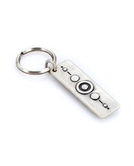 A keychain that carries every Israeli's favorite blessing - Hamsa Hamsa (a superstitious expression)! 
The keychain is designed as a rectangular plate. On one side the words "Hamsa Hamsa Hamsa" are written in between two embossed Hamsa's, which are also inlaid with a turquoise colored stone. 
The other side of the plate is decorated with a charming artistic design.
The keychain is coated in sterling silver and is strong and reliable.
A gift that is fun to give along with a big hug to anyone who we may wish 