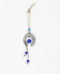 Sterling silver plated car pendant with a blue bead.  Length: 6 cm  Width: 5 cm