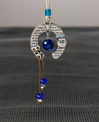 Sterling silver plated car pendant with a blue bead.  Length: 6 cm  Width: 5 cm