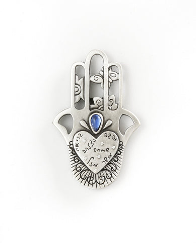 Hamsa shaped magnet with Swarovsky crystal and the 7 blessings.  Length: 7 cm  Width: 5 cm