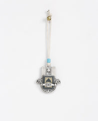 Sterling silver plated car pendant with a turquoise bead.  Length: 7 cm  Width: 6 cm