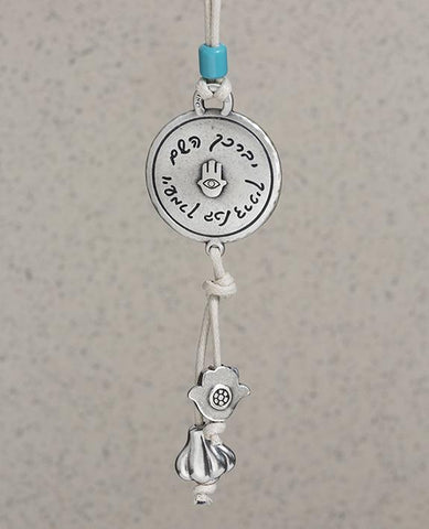 Sterling silver and brass plated car pendant with a blue bead.  Length: 12 cm  Width: 4 cm