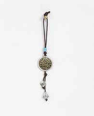Sterling silver and brass plated car pendant with a blue bead.  Length: 12 cm  Width: 4 cm