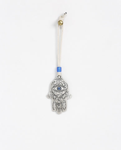 Sterling silver plated car pendant with a blue bead.  Length: 7 cm  Width: 4 cm